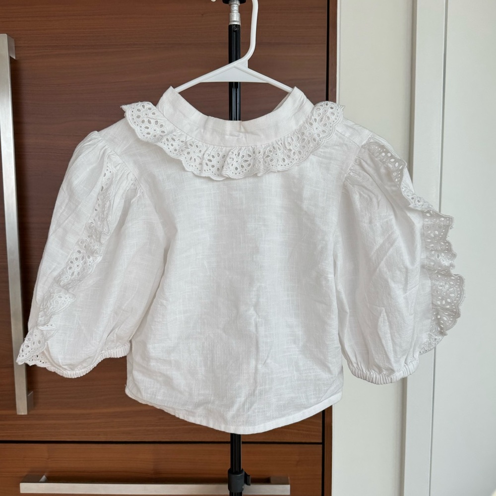 White ruffle top